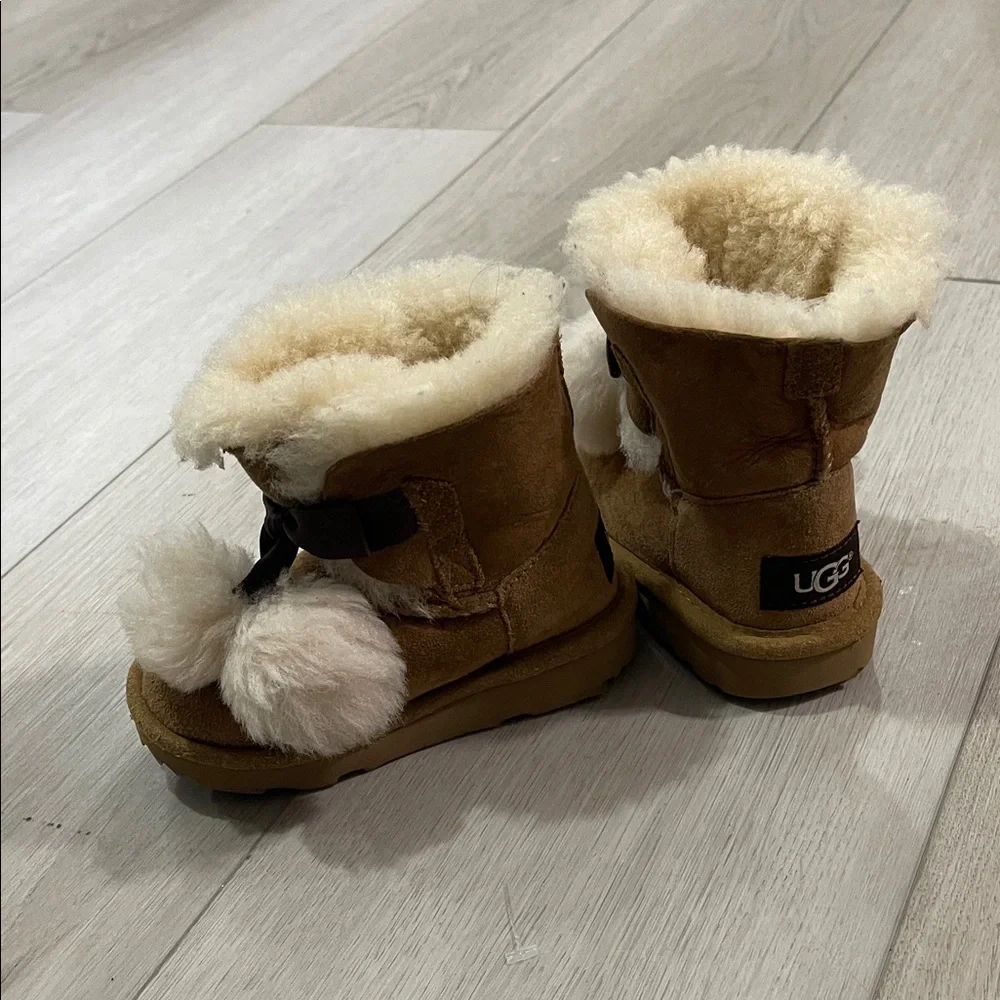UGG Tan Shearling Boots with Pom Poms